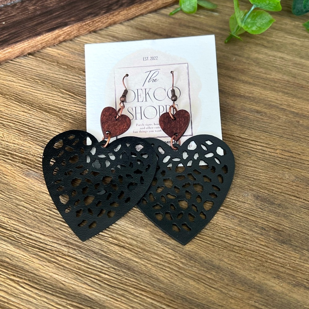 Fashion fishhook earrings with leather heart cutout, wood accent. Lightweight.